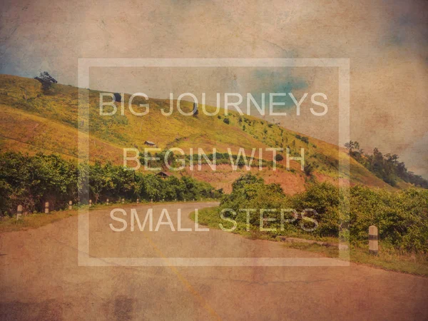 Big journeys begin with small steps over mountain landscape gru