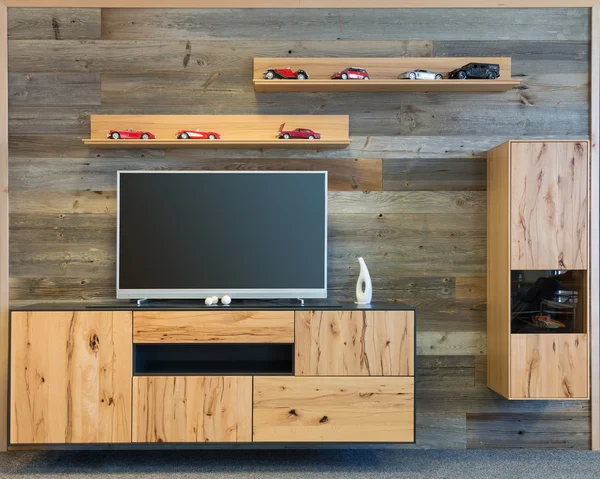 Designer living room wall with tv wooden cupboard and shelf