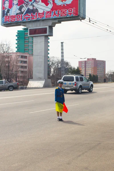 North Korea, Pyongyang, April 2012 - Operators of traffic on the