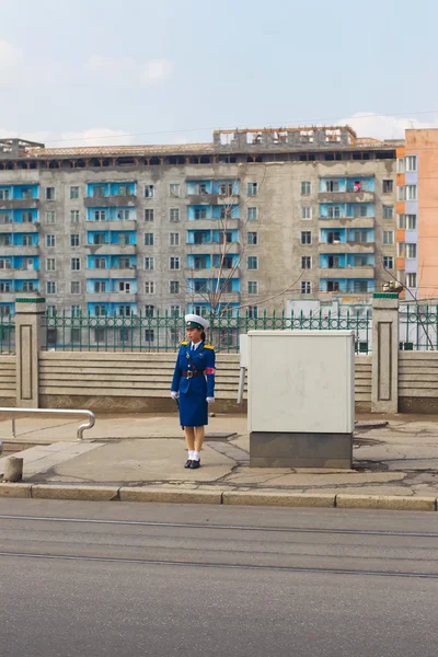 North Korea, Pyongyang, April 2012 - Operators of traffic on the