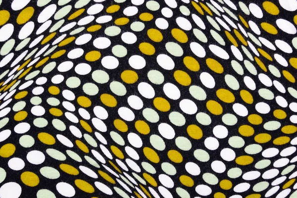 White material in yellow and white dots, a background