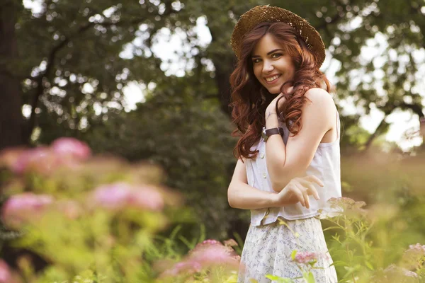 Young beautiful caucasian white brunette woman with curly hairst