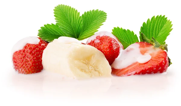 Strawberries with cream and banana slice isolated on the white b