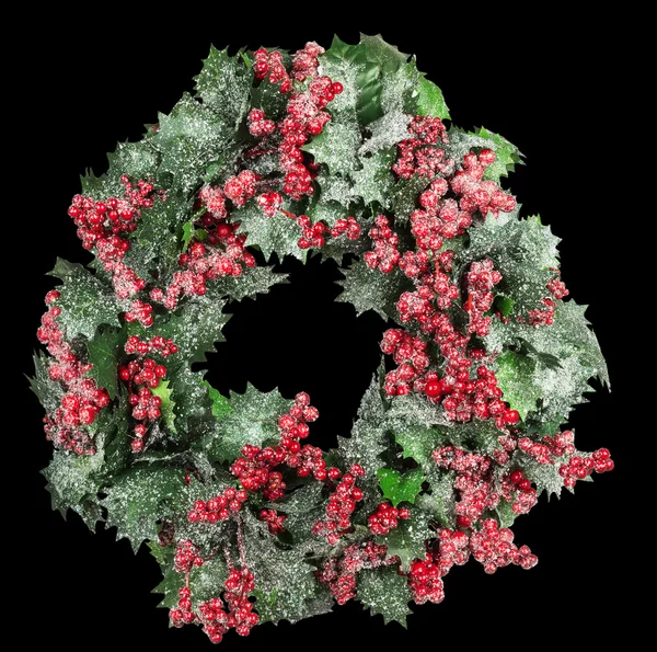 Christmas wreath on the black background
