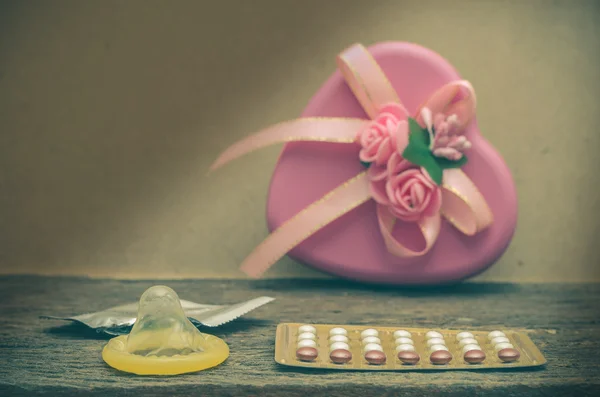 Condom and contraceptive pills