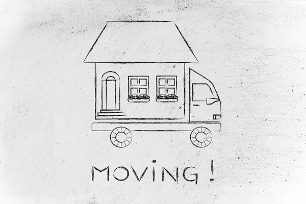 Movers\' truck with house on top, moving!