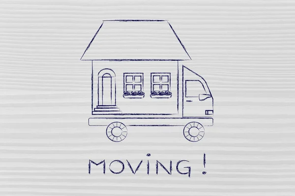Movers\' truck with house on top, moving!