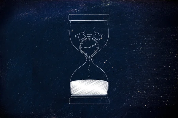 Hourglass with melting alarm clock inside