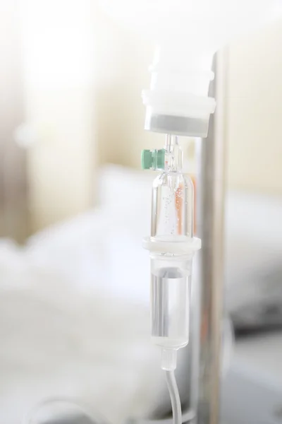 Close up saline IV drip for patient and Infusion pump in hospita