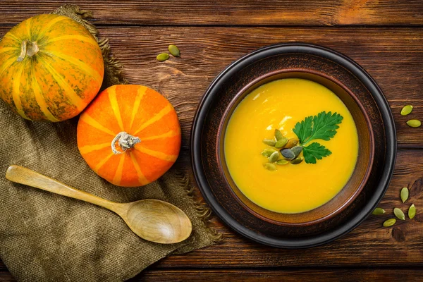 Homemade Autumn Butternut Squash Soup rustic wooden table