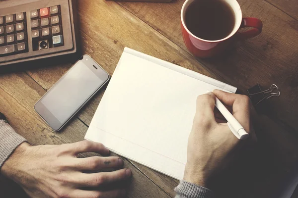 Man writing on paper