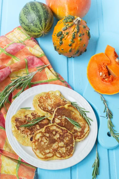 Pancakes with pumpkin, rosemary and cheese