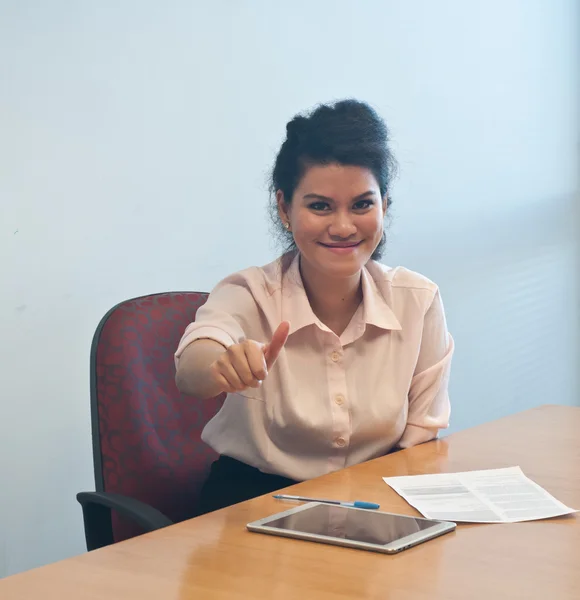 Business woman giving thump up and happy