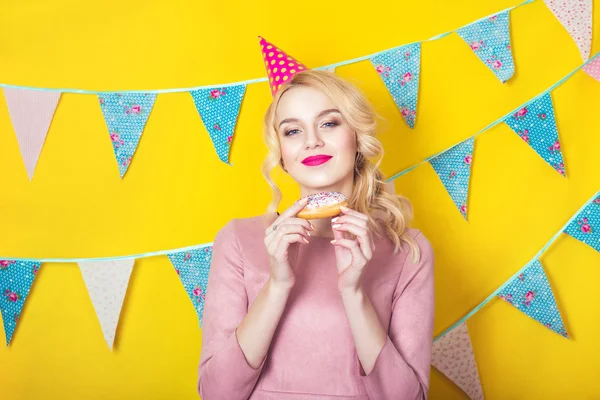 Beauty girl taking colorful donuts. Funny joyful woman with sweets, dessert. Diet, dieting concept. Junk food, Celebration and party.