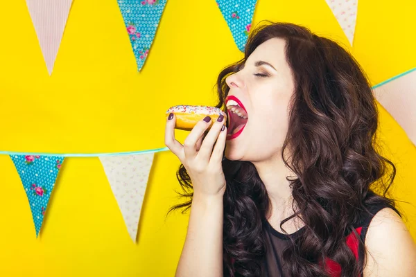 Beauty girl taking colorful donuts. Funny joyful woman with sweets, dessert. Diet, dieting concept. Junk food, Celebration and party.