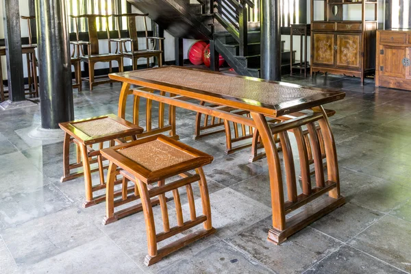 Architecture of Chinese room, interior with wooden chair and des