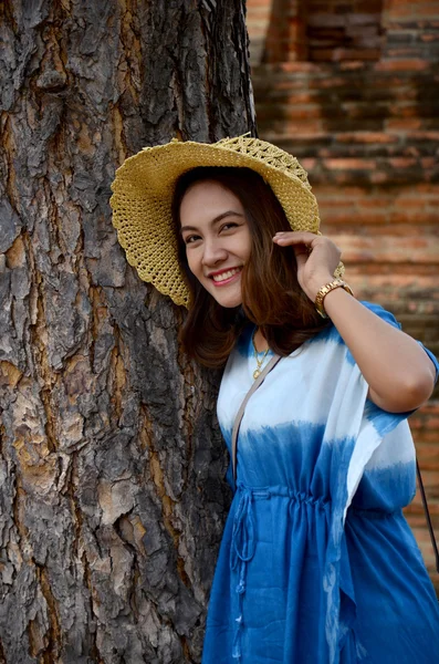 Thai women portrait with tree at ancient building