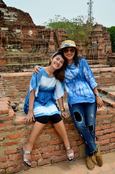 Thai women portrait at ancient building at Wat Mahathat