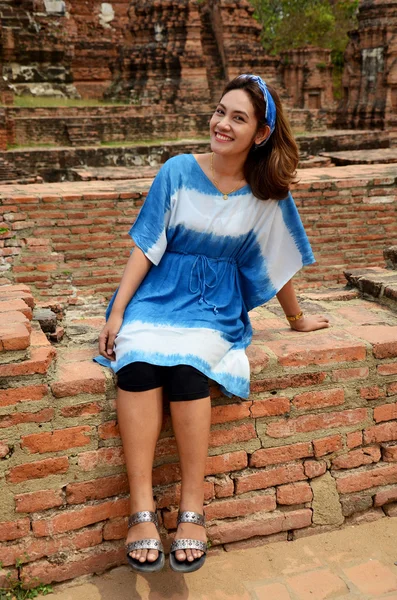 Thai woman portrait at ancient building at Wat Mahathat