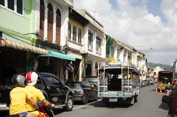 Bus or passenger car run pass old town phuket chino portuguese s