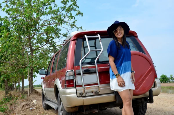Thai woman wear clothes indigo natural color portrait with car a