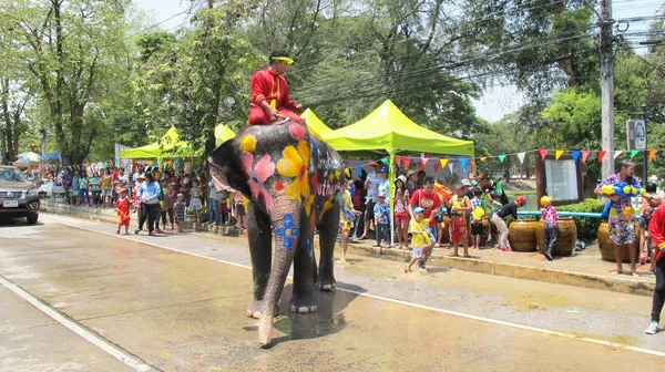 Songkran Festival is celebrated in a traditional New Year is Day from April 13 to 15, with the splashing water with elephants in Ayutthaya, Thailand.