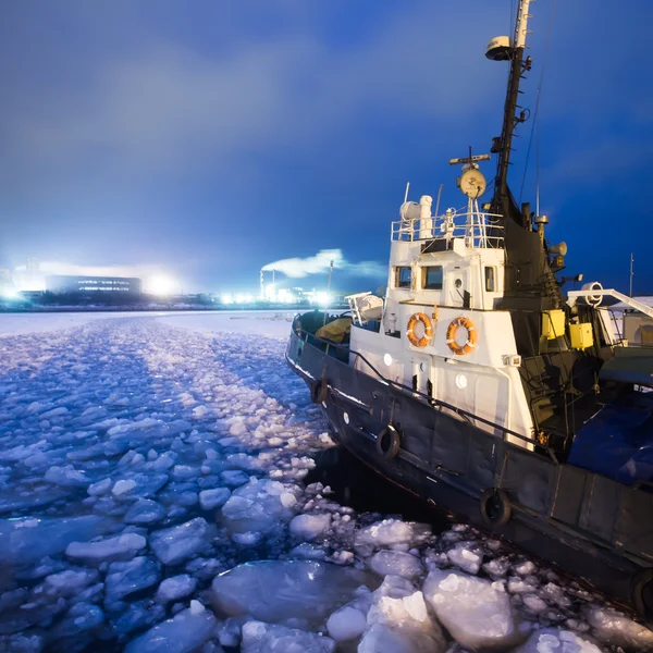 The Icebreaker ship trapped in ice tries to break and leave the
