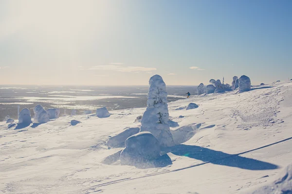 Beautiful cold mountain view of ski resort, sunny winter day with slope, piste and ski lift