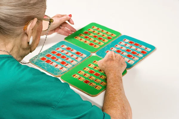 Senior woman playing bingo