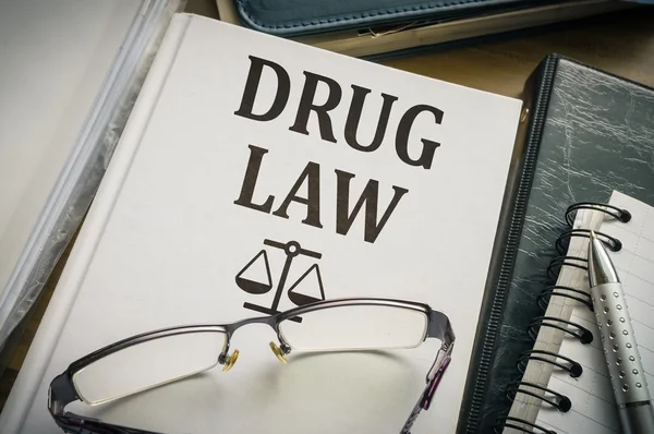 Drug law book. Legislation and justice concept.