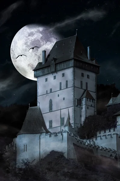 Haunted castle Karlstejn at night