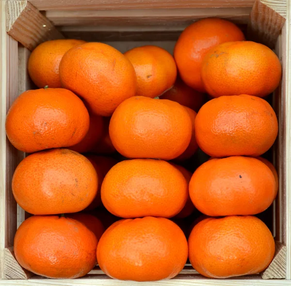 Sweet and bright organic orange tangerines at the farm market