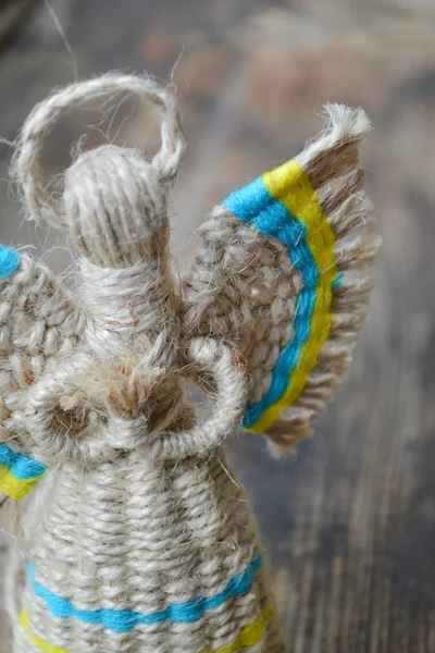 Traditional faceless Ukrainian doll motanka with angel wings and halo