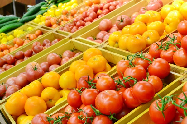 Different vegetables and fruit in grocery store