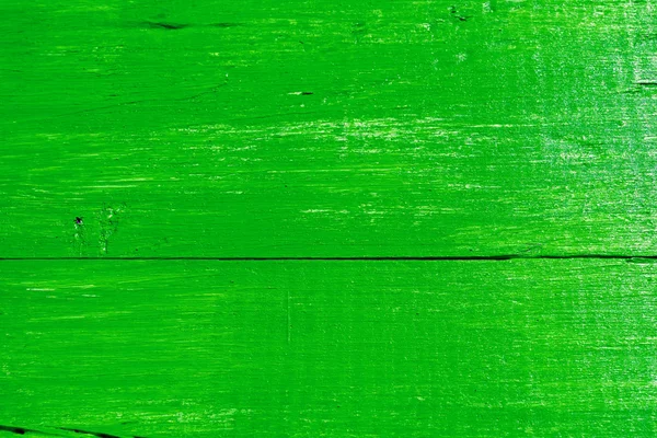 Abstract texture of really old wood colored in green colour