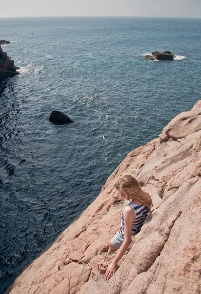 Woman on the rocks