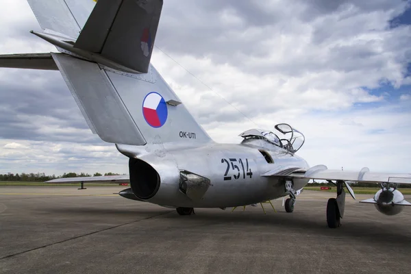 HRADEC KRALOVE, CZECH REPUBLIC - SEPTEMBER 5: Jet fighter aircraft Mikoyan-Gurevich MiG-15 developed for the Soviet Union standing on runway on September 5, 2015 in Hradec Kralove, Czech republic..