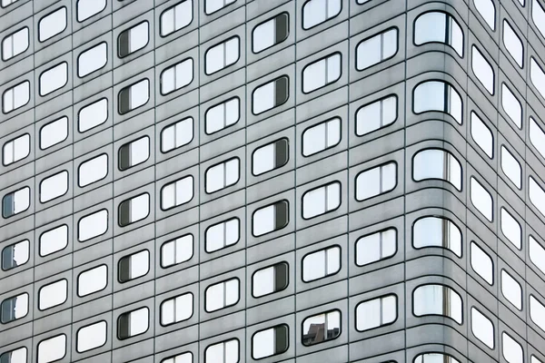 Skyscraper facade with rounded windows