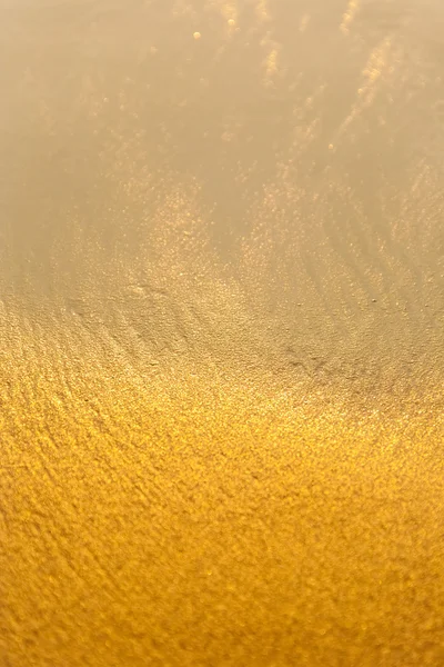 Gold sand and waves
