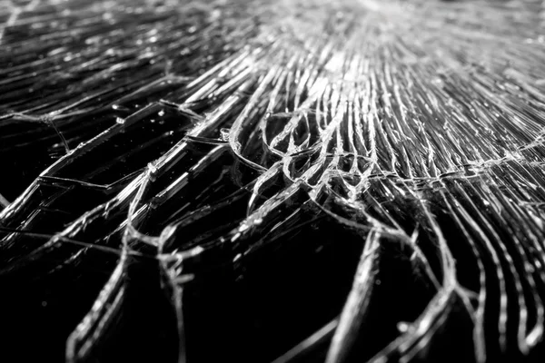 Broken glass with many cracks