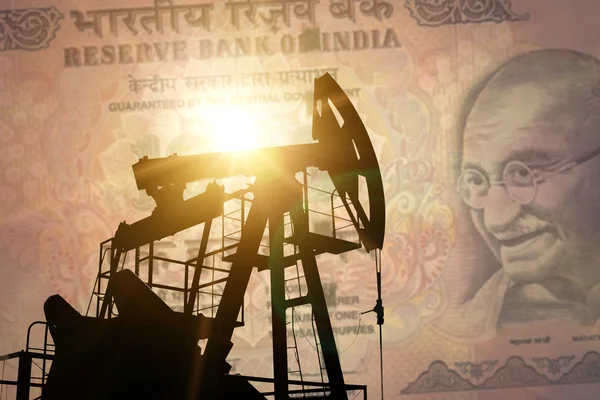 Oil pump with india banknote
