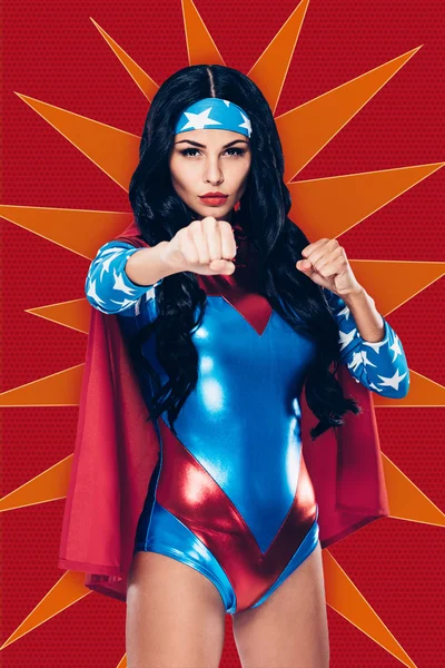 Young woman in superhero costume