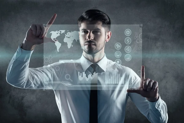 Man working on transparent board