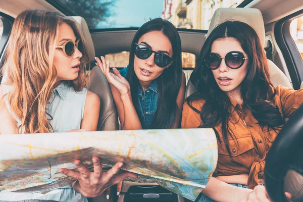 Women with map in car