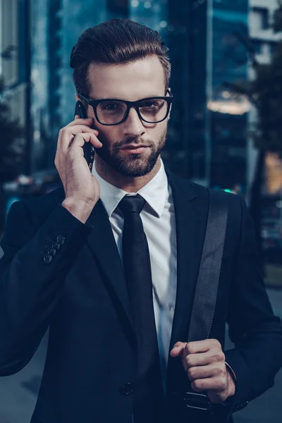 Confident businessman on the phone.