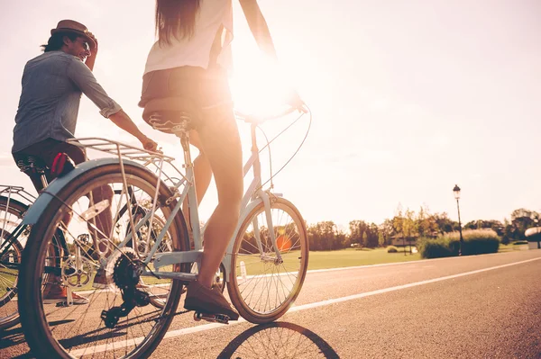 Young people riding bicycles