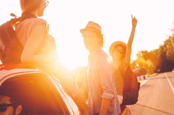 People enjoying road trip