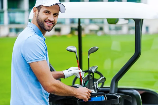 Golfer choosing driver