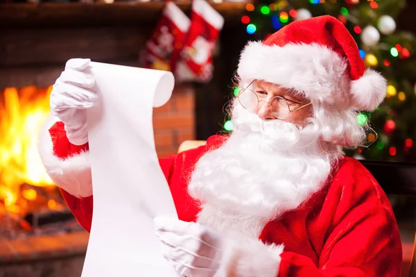 Santa Claus reading letter