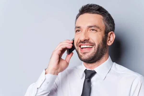Man in shirt and tie talking on the mobile phone